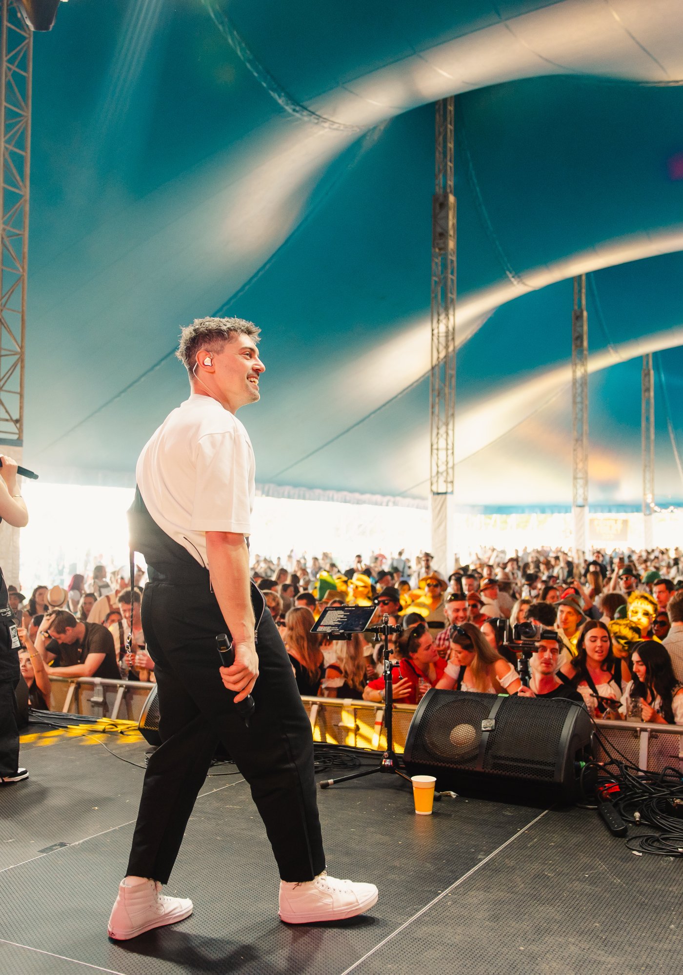 Matt on stage at Oktoberfest with crowd